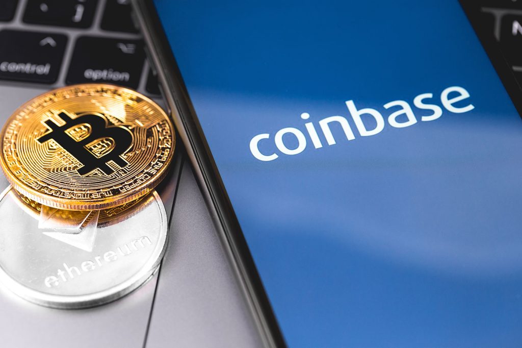 Image showing Coinbase written on Cell Phone with a bitcoin.